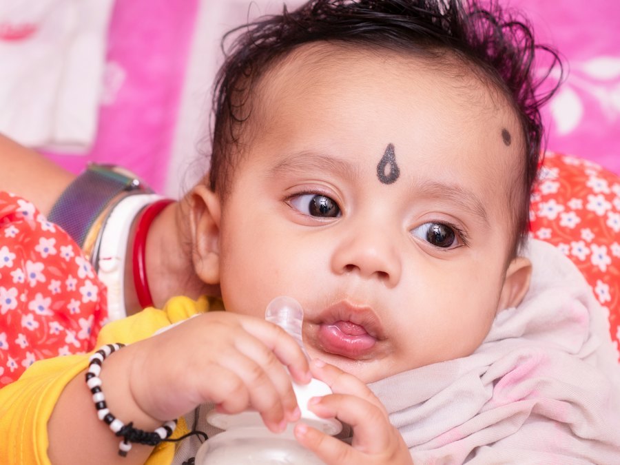 Baby drinking from a bottle