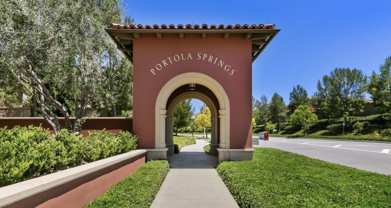 The Portola Springs entrance arch on a sunny day